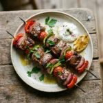Grilled Mediterranean lamb kabobs with vegetables and spices