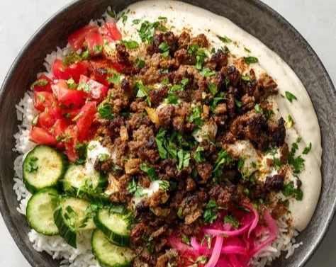 Delicious shawarma bowls featuring seasoned ground beef and fresh ingredients